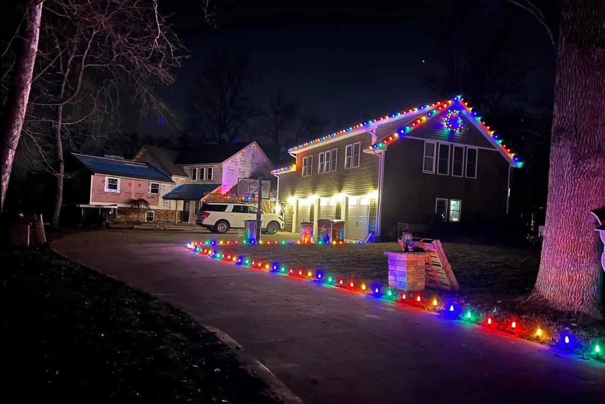 Home with multicolour roofline and driveway lights